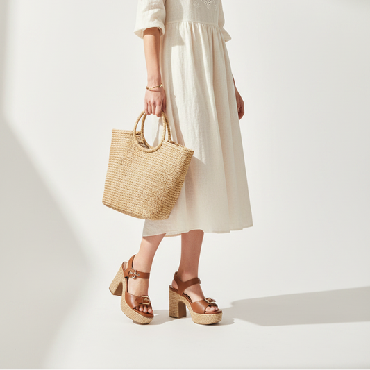 Woman wearing brown platform espadrille heels